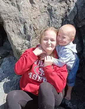 Two children laughing together
